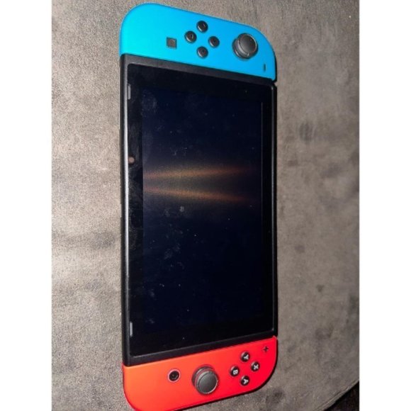 Nintendo Switch™ with Neon Blue and Neon Red Joy‑Con™ - Picture 4 of 7